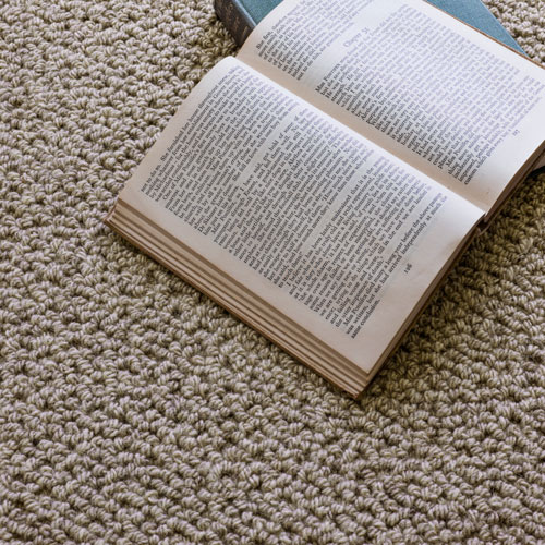 crucial tradin passion soft stell wool carpet in bedroom with book